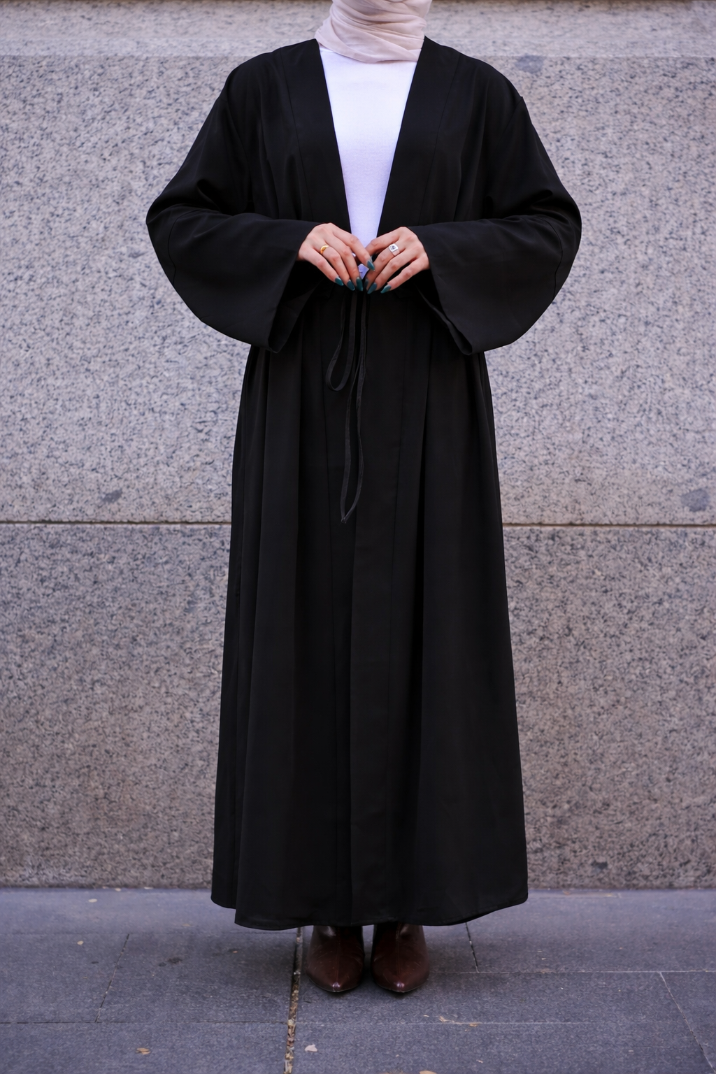 Rowan Belted Abaya in black by Orlena Official, close-up detail of the belted waist on a full-length modest dress