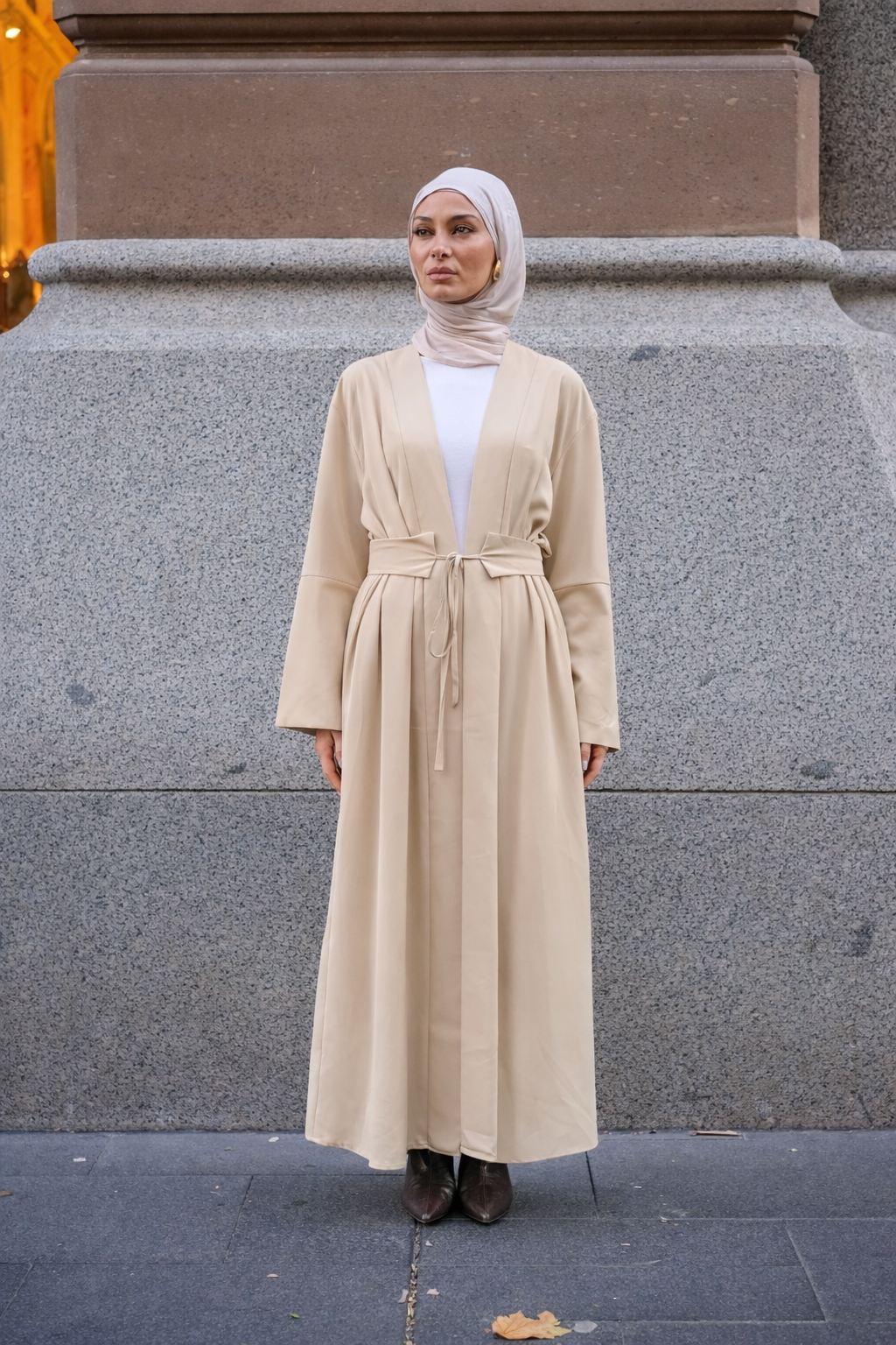Rowan Belted Abaya in beige by Orlena Official, full-length modest dress with a belted waist styled with a hijab