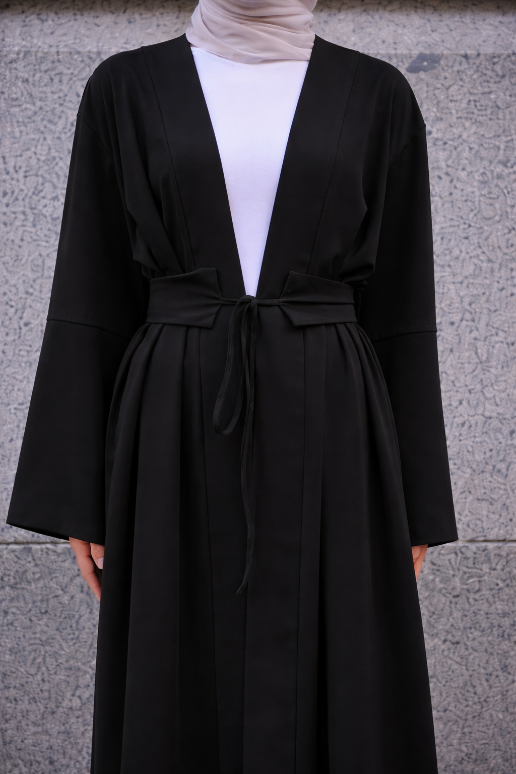 Rowan Belted Abaya in black by Orlena Official, detailed view of the waist and tie belt on a modest dress